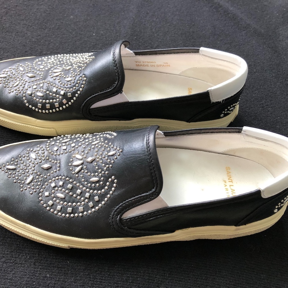 Pair of Saint Laurent, Paris leather slip-ons.